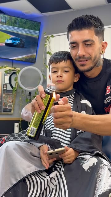 Seven17 barber styling a young client's hair